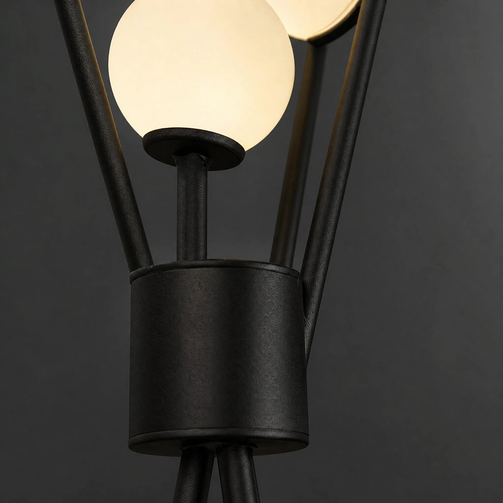 Lampadaire design tripode noir à globes lumineux - close-up détail matière