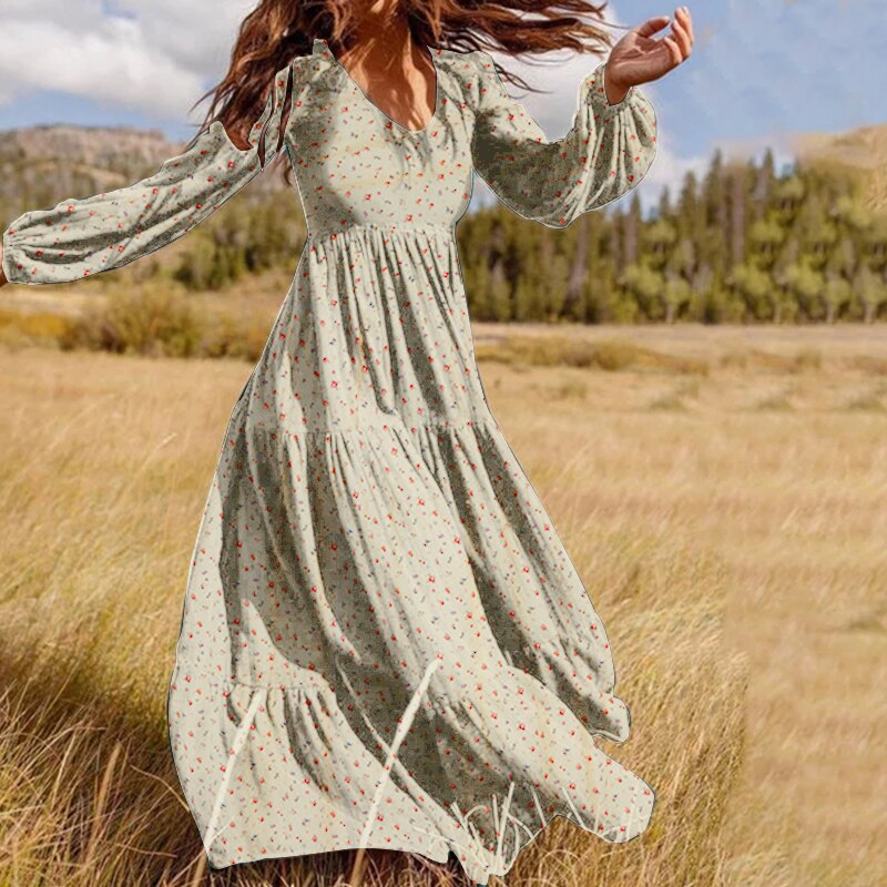 Robe longue vintage boheme portee dans un champ Imagen