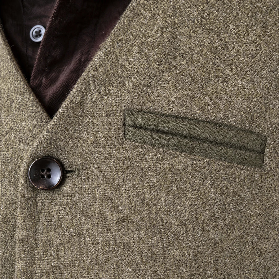 Veste de costume en cuir vintage à boutonnage simple - close-up détail matière