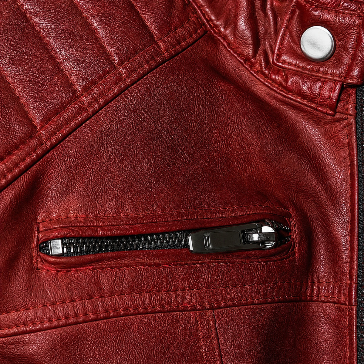 Veste de motard en cuir à fermeture éclair et col montant vintage - close-up détail matière