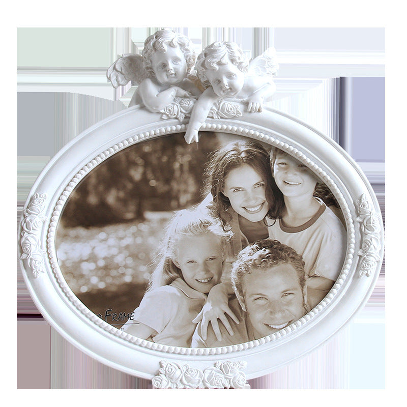 cadre-photo-ovale-en-resine-blanc-argente-retro