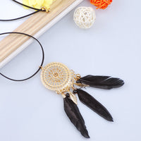 collier-pompon-plume-vintage