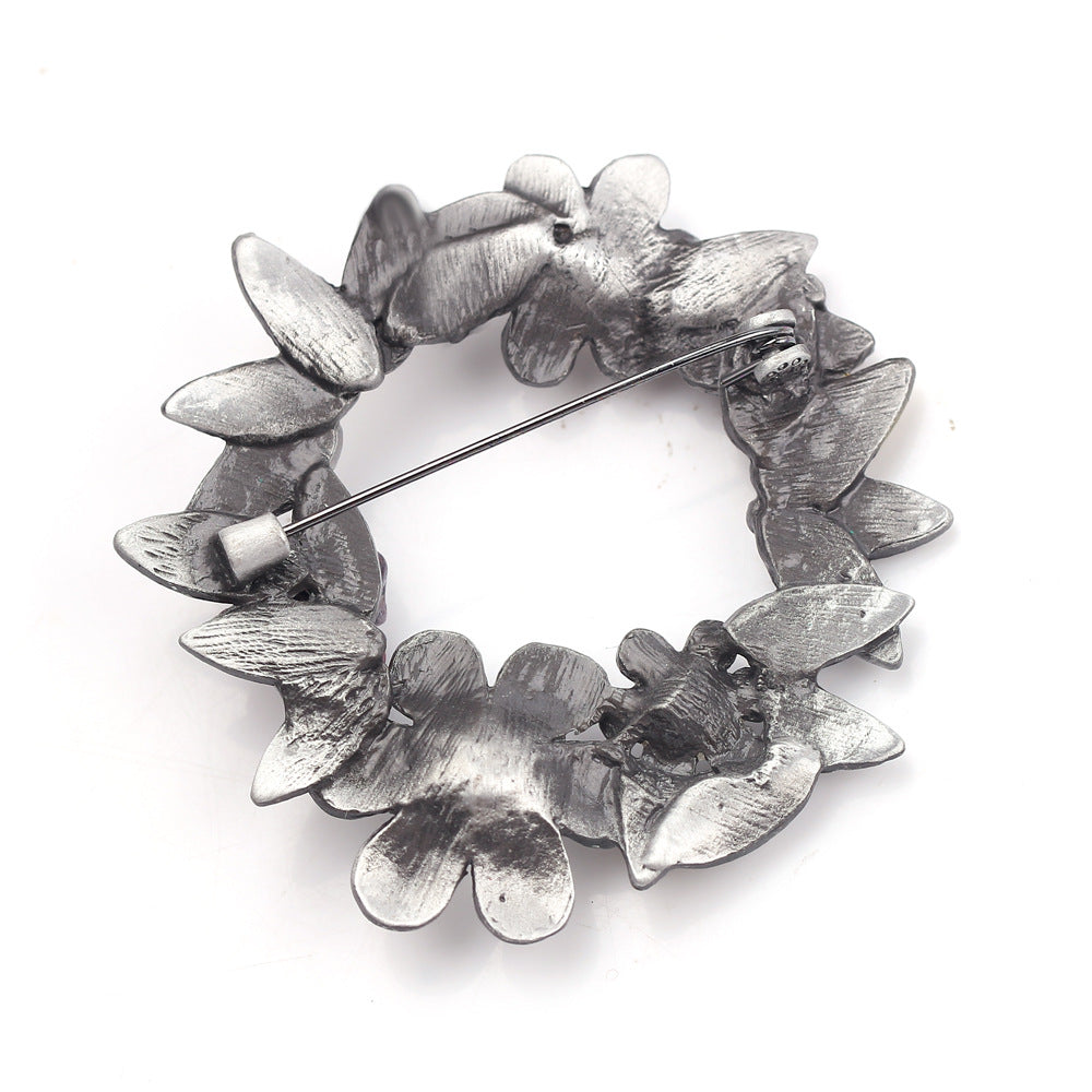 broche-couronne-de-perles-vintage-classique