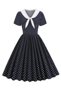 robe-a-pois-noir-et-blanc-annee-80-avec-noeud-papillon