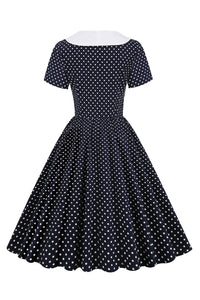 robe-a-pois-noir-et-blanc-annee-80-avec-noeud-papillon